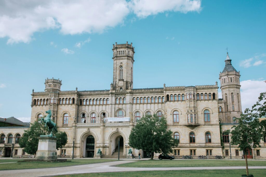 View of Leibniz University in Hannover, Germany, showcasing its historic architecture.