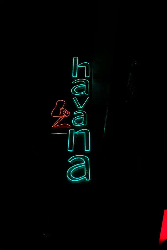 Bright neon Havana sign illuminating the night in Saint Julian's, Malta.