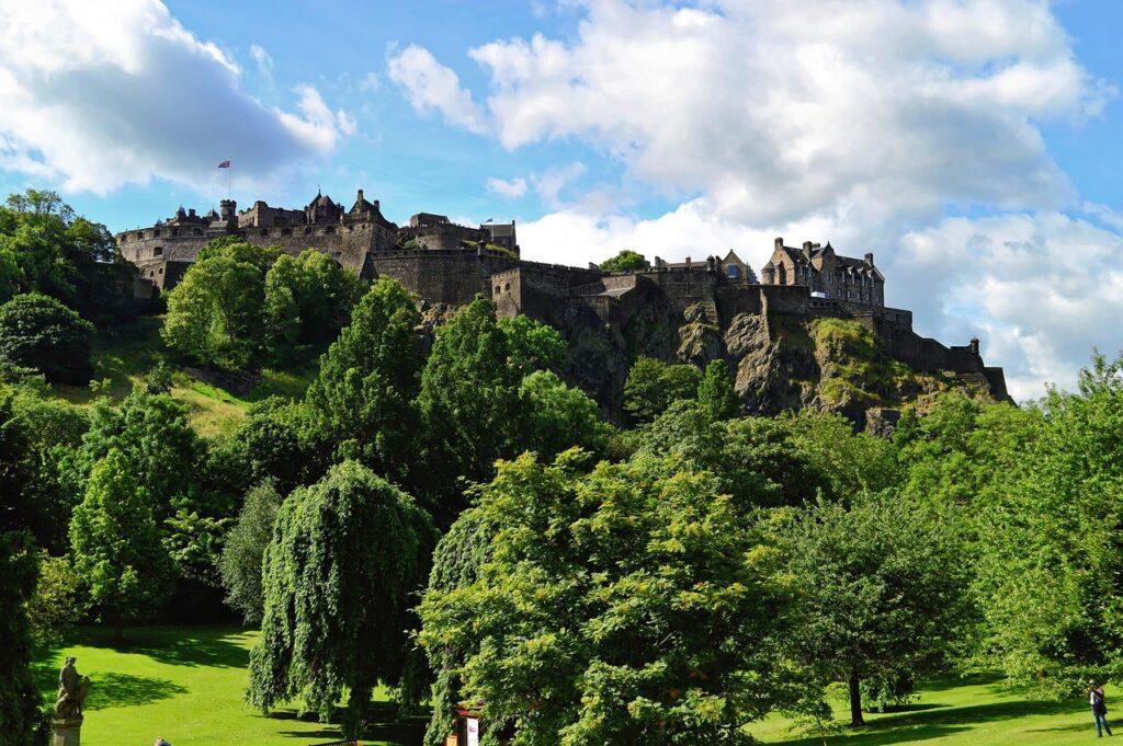 edinburgh castle, edinburgh, castle, scotland, city, trees, landscape, architecture, scottish, old, building, tourism, historic, landmark, famous, monument, sky, hill, tourist, ancient, scenic, green sky, green city, green landscape, green building, green castle, nature, green old