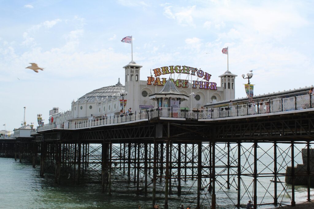Explore the iconic Brighton Palace Pier in England, set against a stunning seaside backdrop.