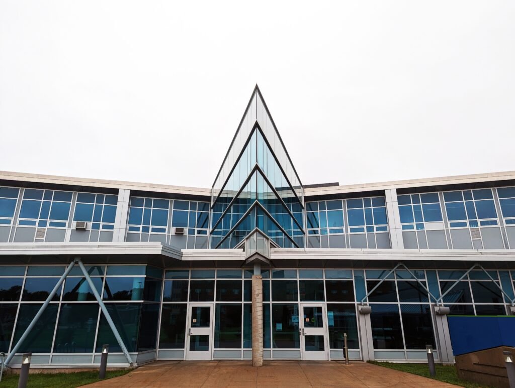 Symmetrical modern building facade with large windows in Truro, Nova Scotia.